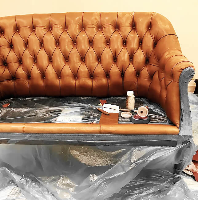 Leather sofa refinishing process – restoring original color and texture