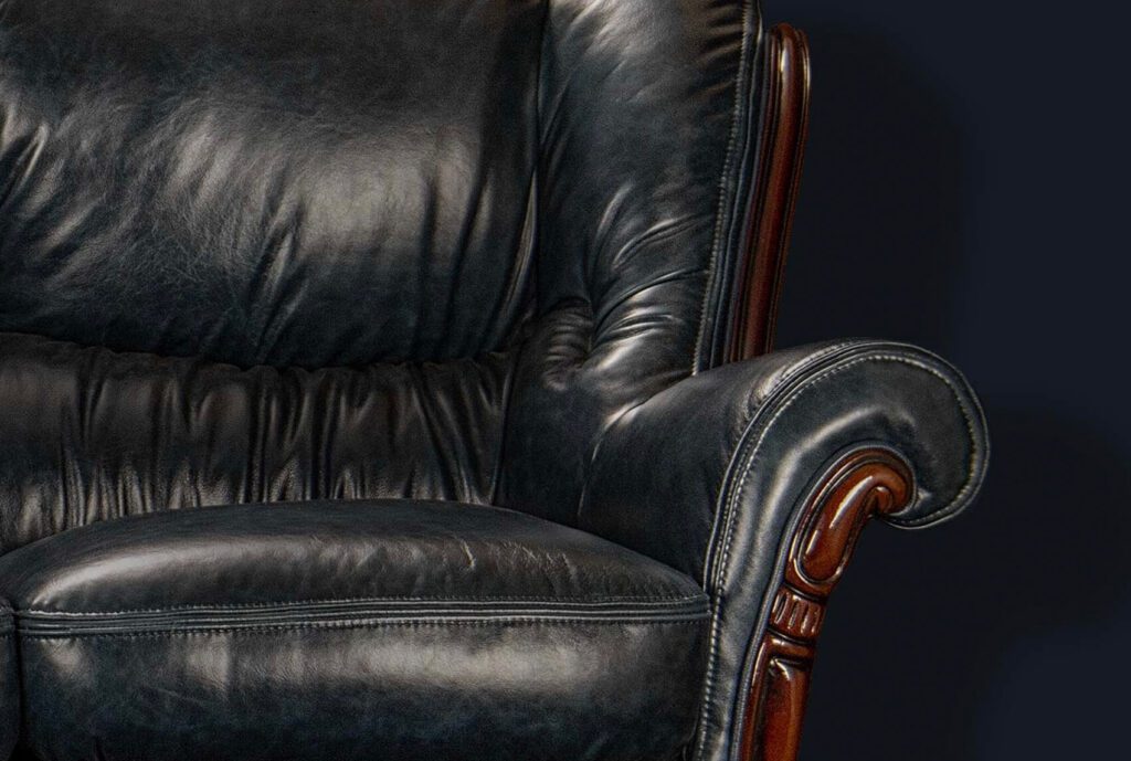 Black commercial leather sofa repair – fixing cracks and fading