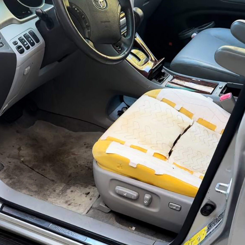 Car seat with the leather cover removed for repair