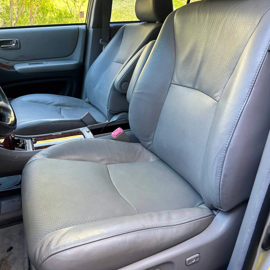 Light gray car leather seat cover after repair and reinstallation