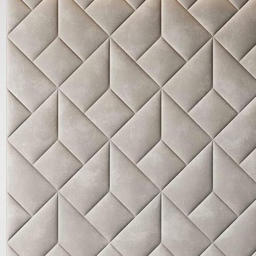 Light neutral geometric upholstered wall panels with angular pattern