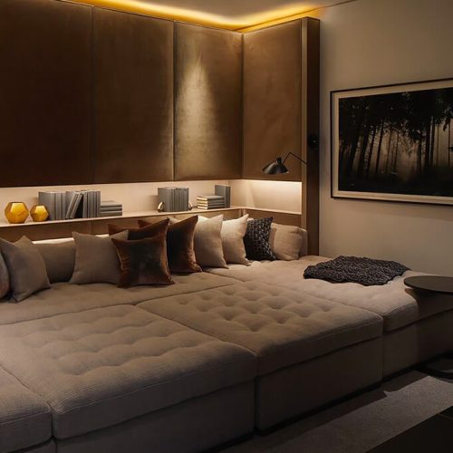 Premium upholstered wall panels creating a refined home theater interior